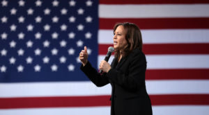 Vice president-elect Kamala Harris in front of an American flag